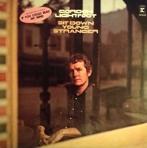 Gordon Lightfoot's "Sit Down Young Stranger" album cover via Record Cellar https://recordcellar.ca/product/gordon-lightfoot-sit-down-young-stranger/